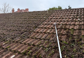 manual roof cleaning